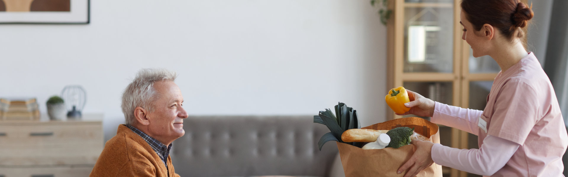 Lady unpacking the groceries